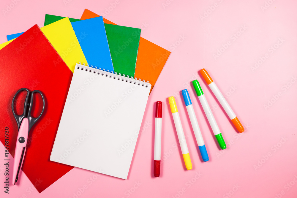 Fototapeta premium Back to school concept, flat lay of vibrant school or office colorful supplies, school stationery on pink background. flat lay, top view