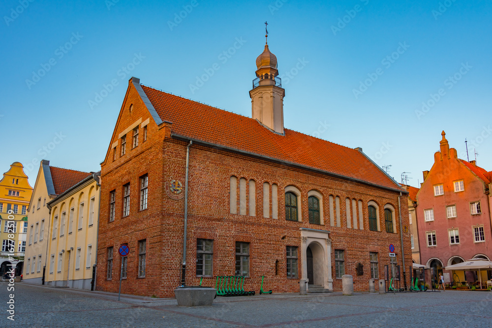 Obraz premium Sunset view of the old town hall in Olsztyn, Poland