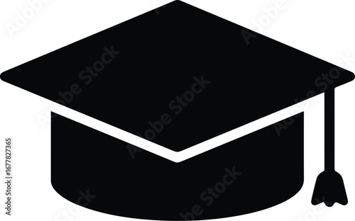 Flat lay of a black graduation cap with a tassel on a white background.