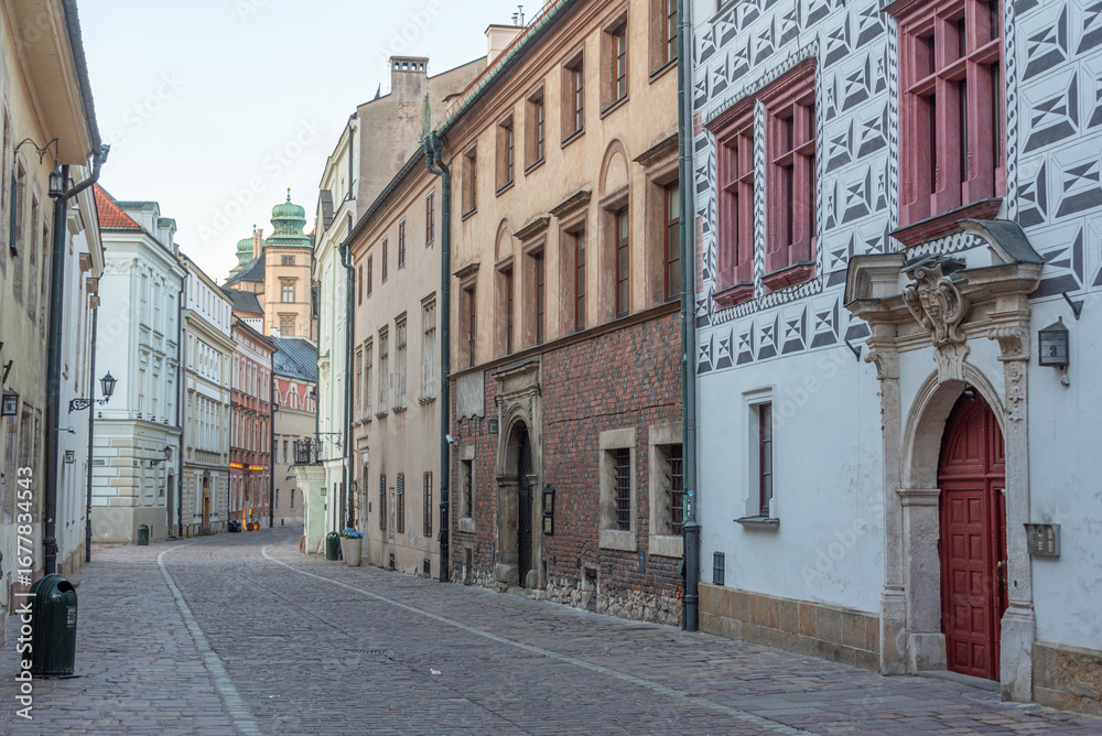 Fototapeta premium Narrow street in the historical center of Krakow, Poland
