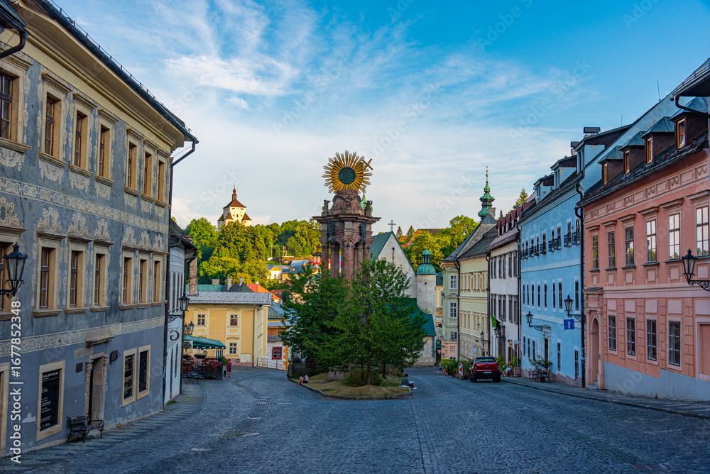Fototapeta premium Sunset view of the holy trinity square in Banska Stiavnica, Slov