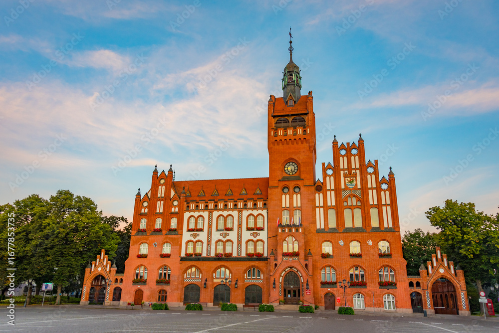 Fototapeta premium Sunrise view of town hall in Slupsk, Poland