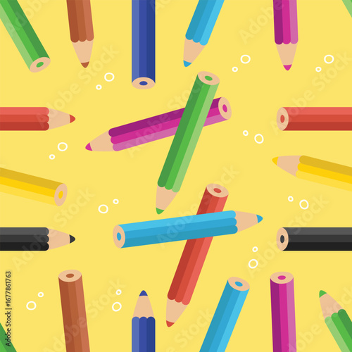 Seamless pattern of colorful pencils scattered on a yellow background. Vector illustration.