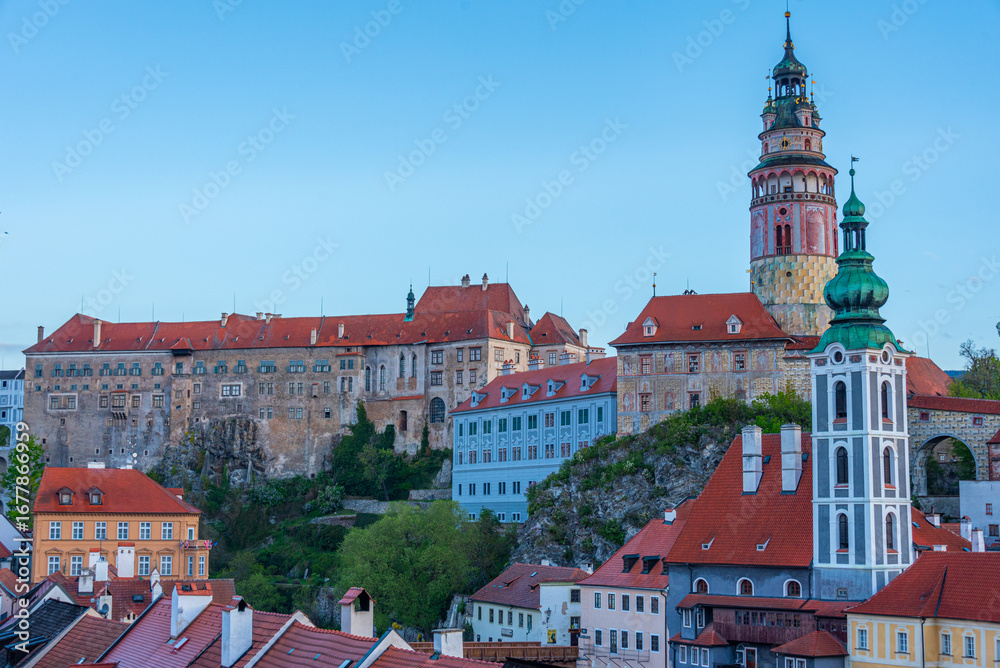 Obraz premium Sunrise view of Cesky Krumlov castle and Saint Jost church, Czec