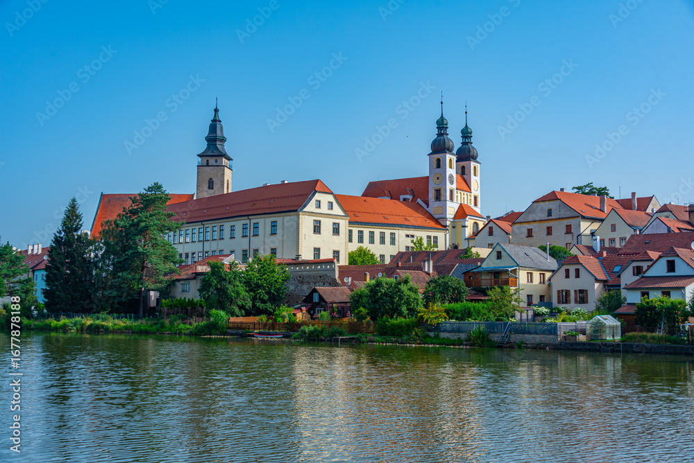 Obraz premium Reflection of Telc castle in Czech republic