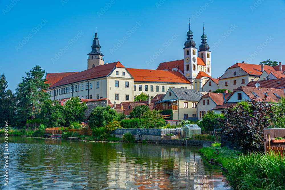 Naklejka premium Reflection of Telc castle in Czech republic