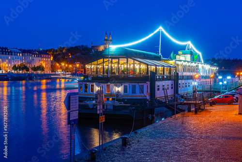 Sunset view of Smichovska naplavka riverside in Prague, Czech re