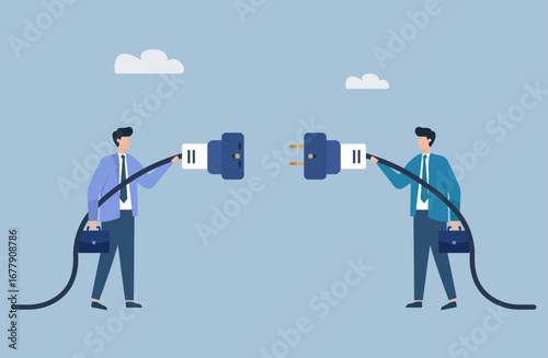 Two businessmen connect an electrical plug, representing partnership, collaboration, synergy, and teamwork to achieve a common goal