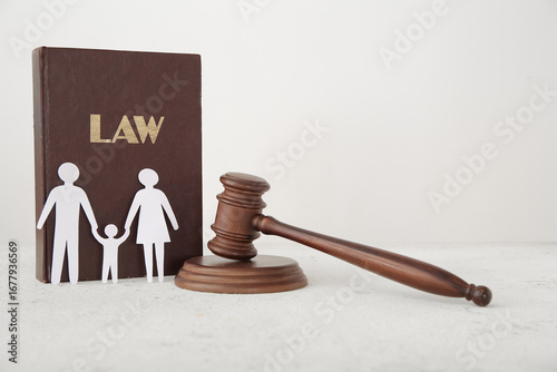 Figures of family with judg...
