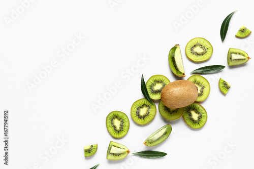 Wallpaper Mural Slices of fresh kiwi and leaves on white background Torontodigital.ca
