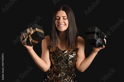 Young woman with gifts on d...