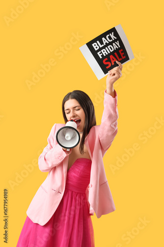 Young woman shouting into m...
