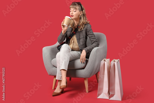 Stylish young woman with co...