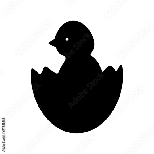 Black silhouette of a hatching chick emerging from a broken eggshell