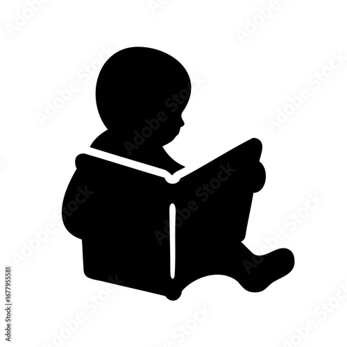 Silhouette of a baby sitting and reading a book with great interest