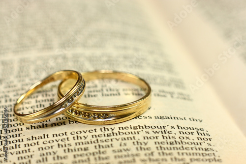 Wedding Rings on Bible Pages