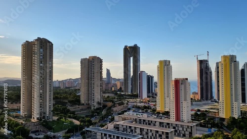 Wallpaper Mural A breathtaking, beautiful view of a modern city skyline filled with vibrant skyscrapers during a stunning sunset Torontodigital.ca