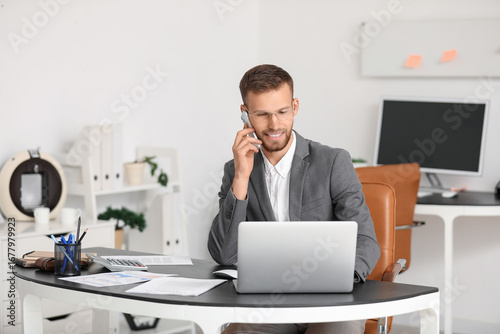 Young businessman in eyegla...