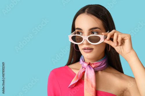 Beautiful young woman in st...