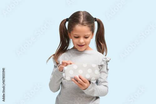 Cute little shocked girl wi...
