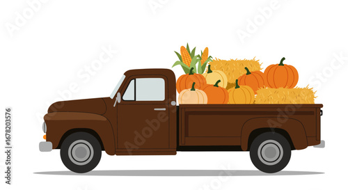 Truck hauling pumpkins corn and hay bales
