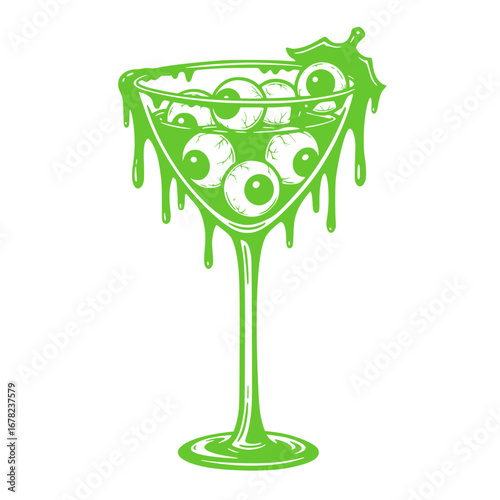 Slime cocktail glass filled with eyeballs and green dripping goo with garnish on top. Halloween concept

