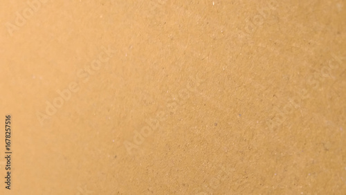 Background of brown kraft paper or cardboard texture. Brown recycled paper texture background.