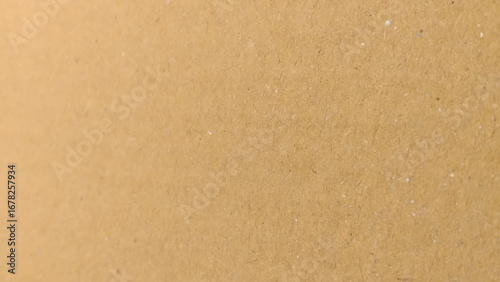 Background of brown kraft paper or cardboard texture. Abstract pattern of beige rough carton, old paper sheet, parchment or papyrus surface,