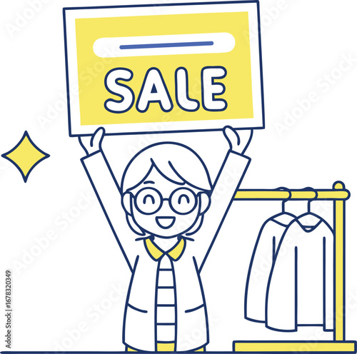 Smiling female shopkeeper cheerfully hoists a large yellow 'SALE' sign above clothes rack