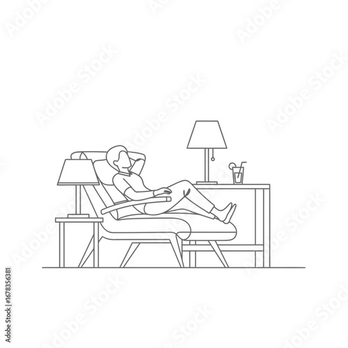 A person relaxing comfortably in a lounge chair with their feet up, enjoying a moment of leisure at home.