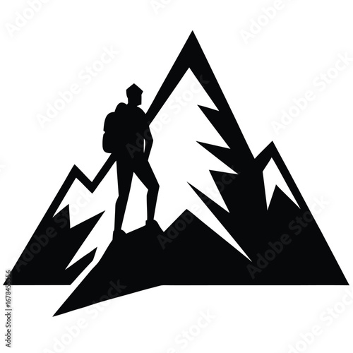 A hiker on a mountain peak 