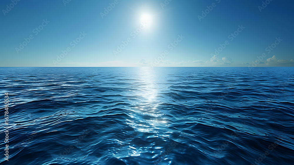 Obraz premium Bright sun casts shimmering reflections on the deep blue ocean surface extending calmly towards the vast horizon.