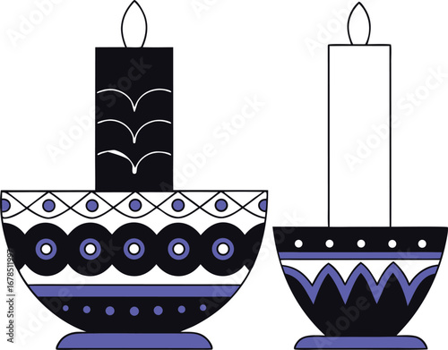 Two decorative candle holders with lit candles