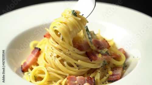 Mouth-watering Macro Shot of a Fork Twirling Creamy Spaghetti Carbonara with Pancetta
