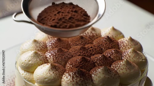 Elegant Slow Motion of Dusting Cocoa Powder over a Creamy Tiramisu Dessert