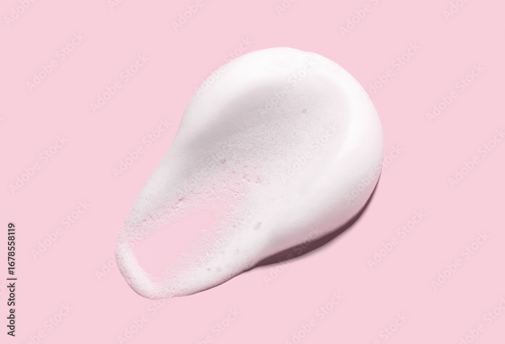 Fototapeta premium texture foam mousse foam cosmetic smear sample on pink background