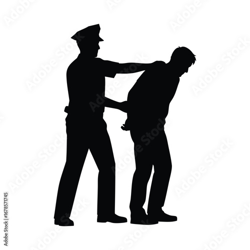 Silhouette of a police officer arresting a man