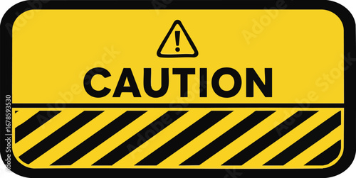 Prominent caution sign with hazard stripes and warning symbol for safety awareness