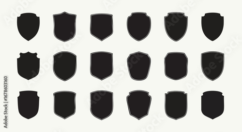 Collection of elegant black shield emblems and badges for modern design projects