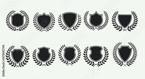 A collection of ten black shield icons, each surrounded by a laurel wreath, set against a white background.