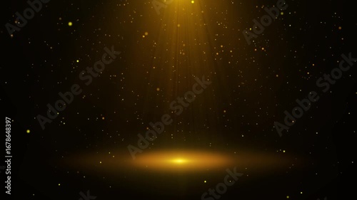 A stage with falling golden particles and lights.