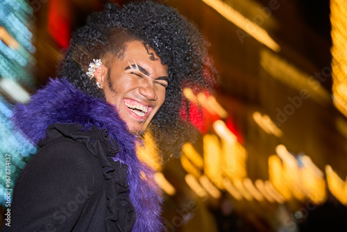 Konstfotografi Young drag queen laughing in times square at night
