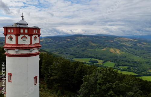 Observation ancient tower on the top of Mount Biskupia Kopa Opawskie Mountains, Poland. View from the top to the mountain valley of the Czech and Poland.