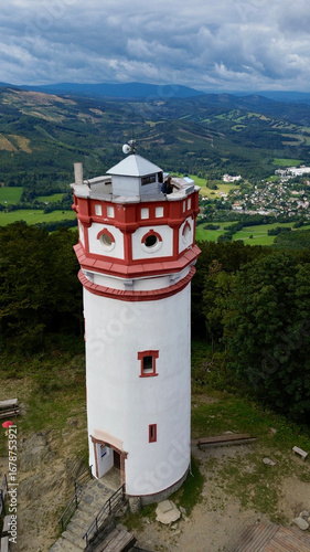 Observation ancient tower on the top of Mount Biskupia Kopa Opawskie Mountains, Poland. View from the top to the mountain valley of the Czech and Poland.