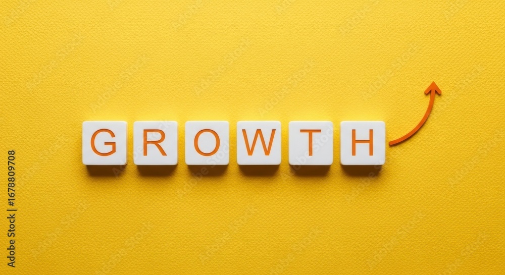 Obraz premium The word growth spelled out in white blocks with an orange arrow on yellow background
