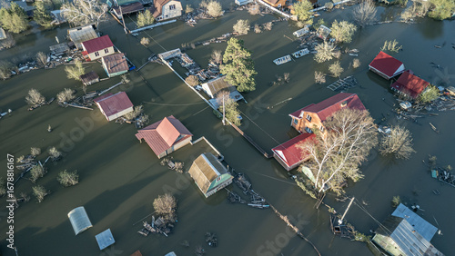 Fotografi Aerial drone footage showing severe flooding with submerged houses and roads