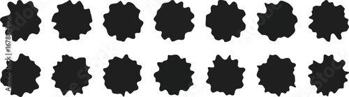 Abstract black circular shapes arranged in a grid pattern.