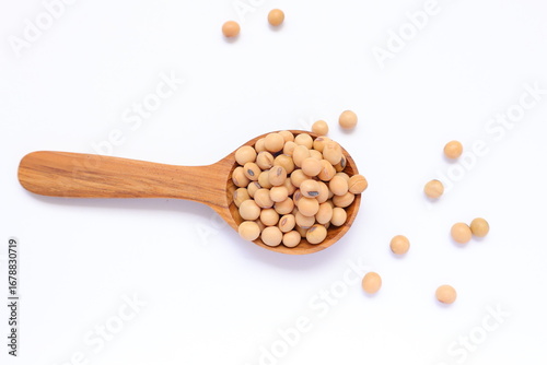 Soybean in spoon on white background, soy beans on white 