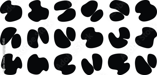 Abstract black shapes arranged in rows and columns on a white background.