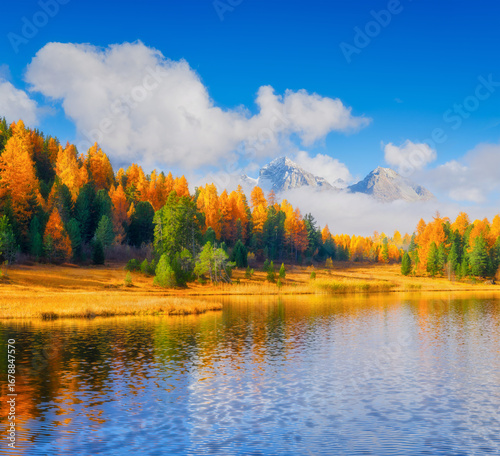 Autumn landscape. Nature. Clouds over the mountains and autumn forest. Incred...